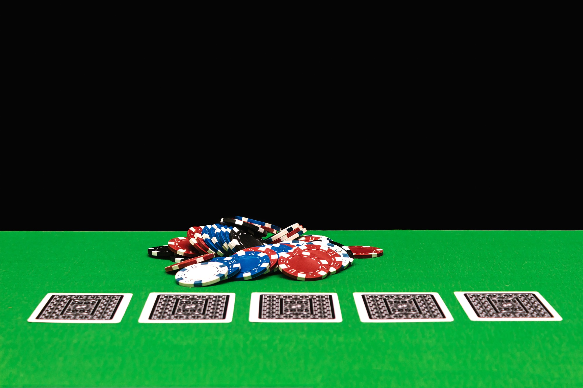 Poker chips on a gaming table in a casino